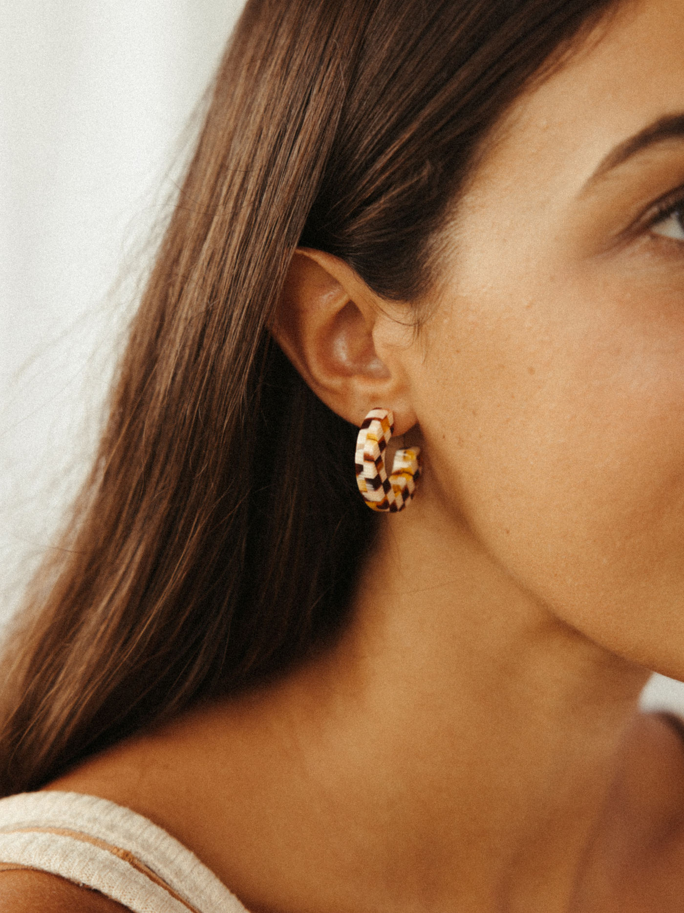 tan checkered earrings