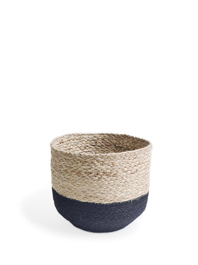 Handwoven from Jute, Naiya Bin comes in three different sizes. Jute's raw texture with soft black's simple design will add natural warmth to your space.