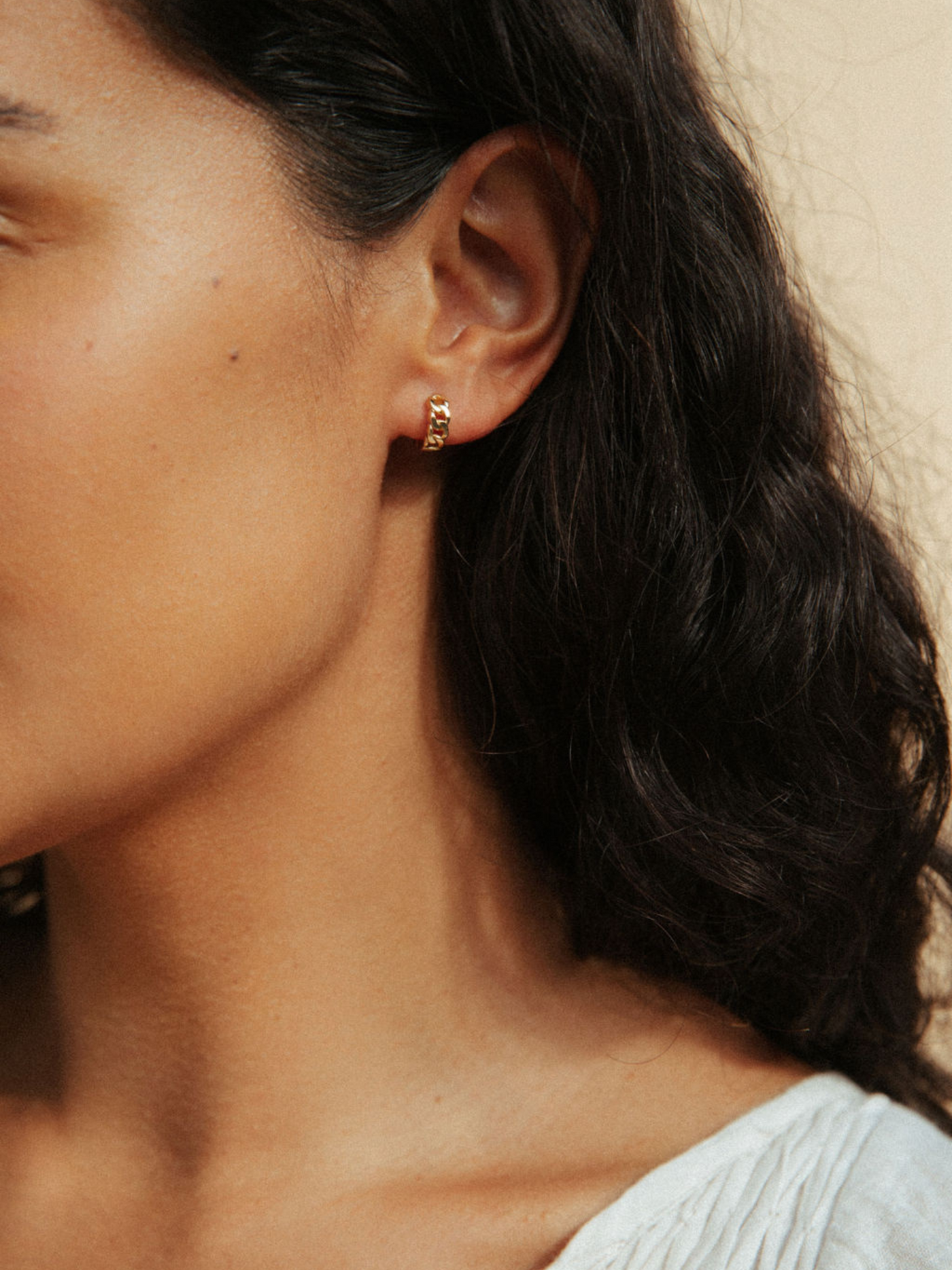 gold huggie hoop earrings with chain detail